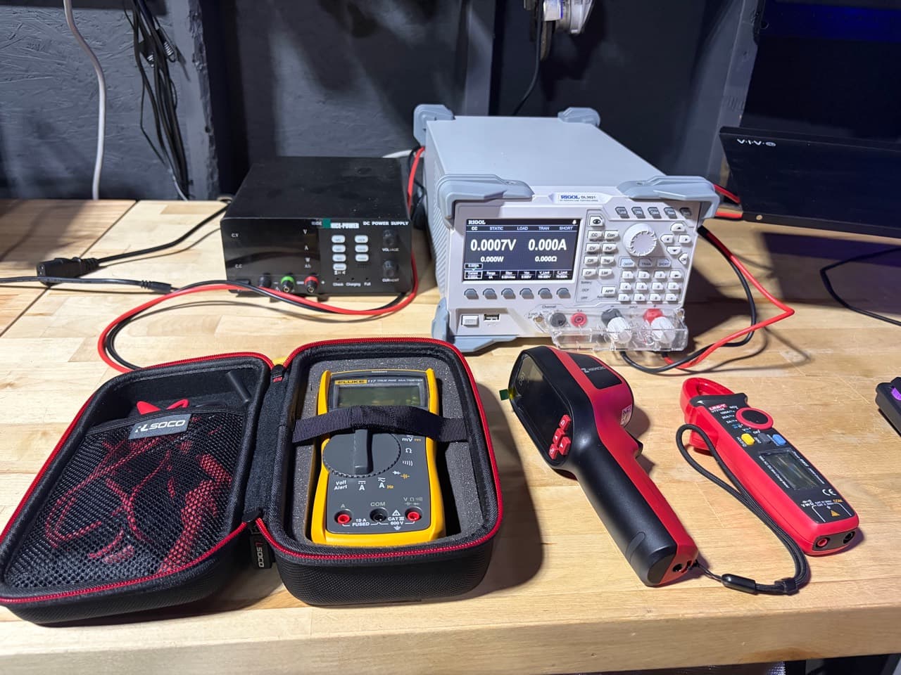 Sprocket Science electrical diagnostic instruments including a RIGOL electronic load, meters, and thermal camera